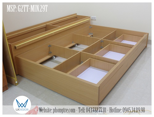 Giường tầng dưới và hộc kho 2 khoang của giường tầng thấp đa năng vân gỗ melamine màu vàng bích của chị Phương Hoa