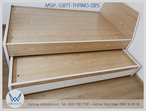Giường tầng thấp G2TT-THANG.02S tạo mẫu đầu cao hình thang thật cá tính, sử dụngi melamine vân gỗ sồi phối màu trắng phong cách hiện đại