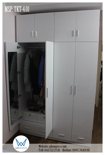 Buồng tủ bên trong có suốt treo đồ dài phía trên, phía dưới là 2 ngăn kéo có khóa và có làm thêm gương soi toàn thân gắn vào cánh tủ
